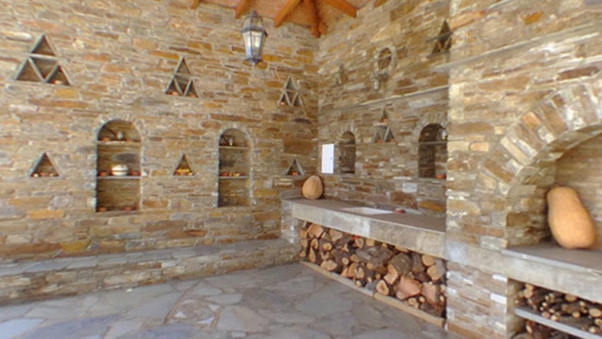 Traditional stone outdoor barbecue and wood oven
